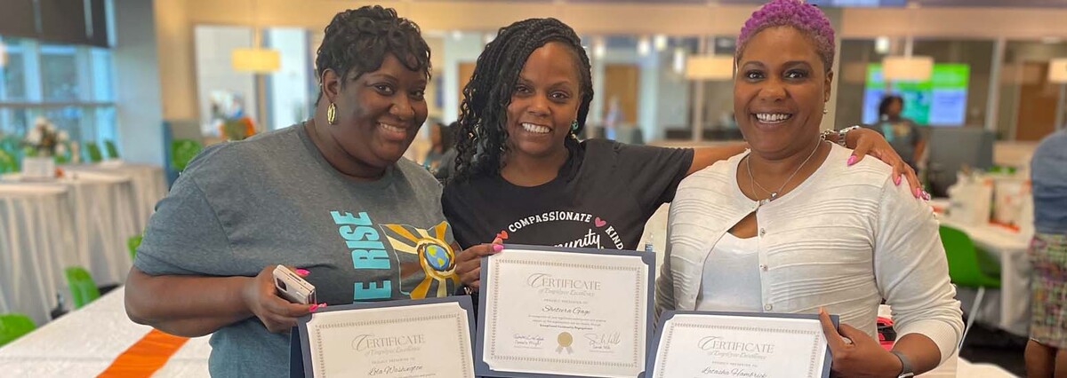 group image of women with certificates