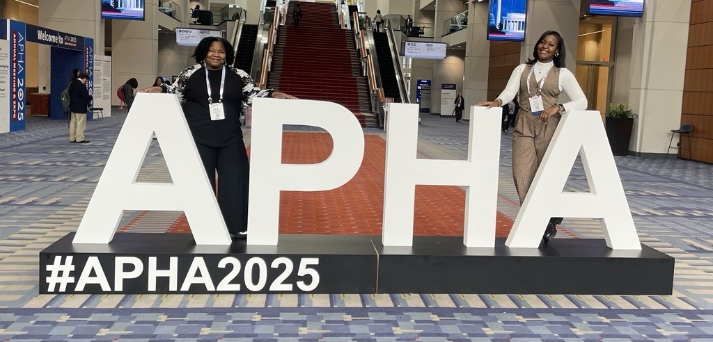 Two women at a conference