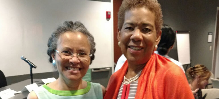 Judith Warren smiling with Dr. Camara Jones