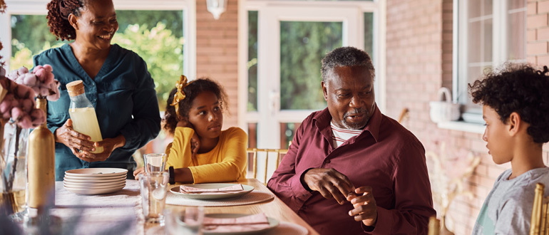 People sitting around a table talking