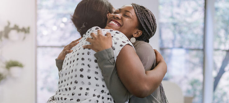 Women hugging