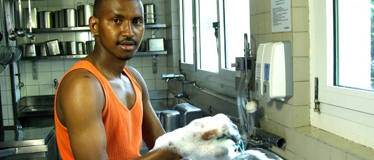 Man washing dishes