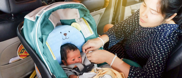 Woman looking at baby