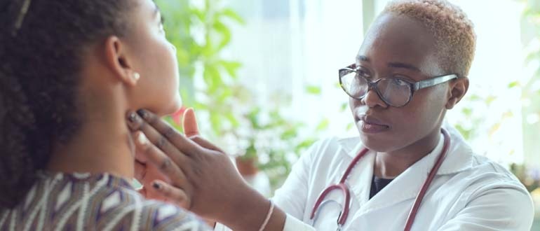 Docter working on a patient