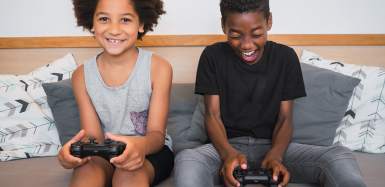 Two children playing video games