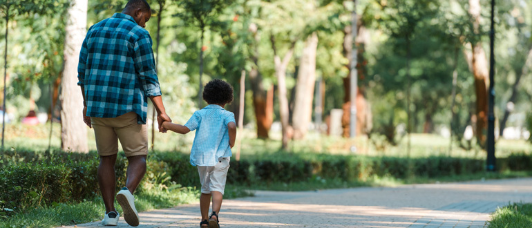 Man walking with a child