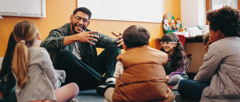 Man talking to children